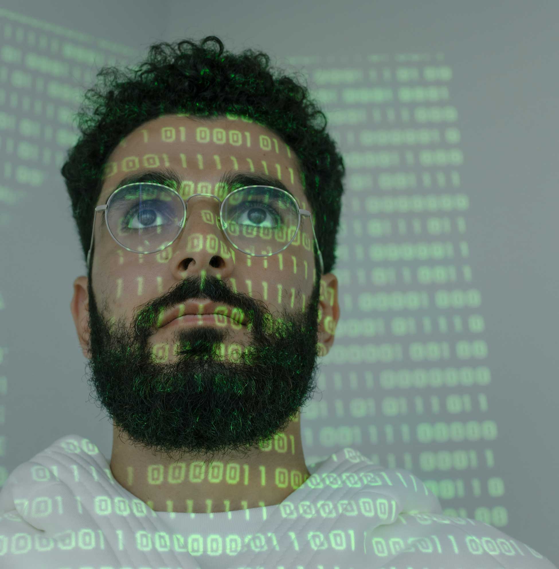 a man reading a binary code